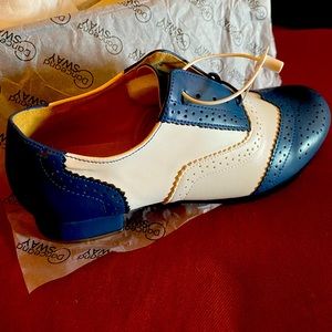 Brand new, never worn, LEATHER 2.5 heel tap shoes. US size 7.5 Beautiful!